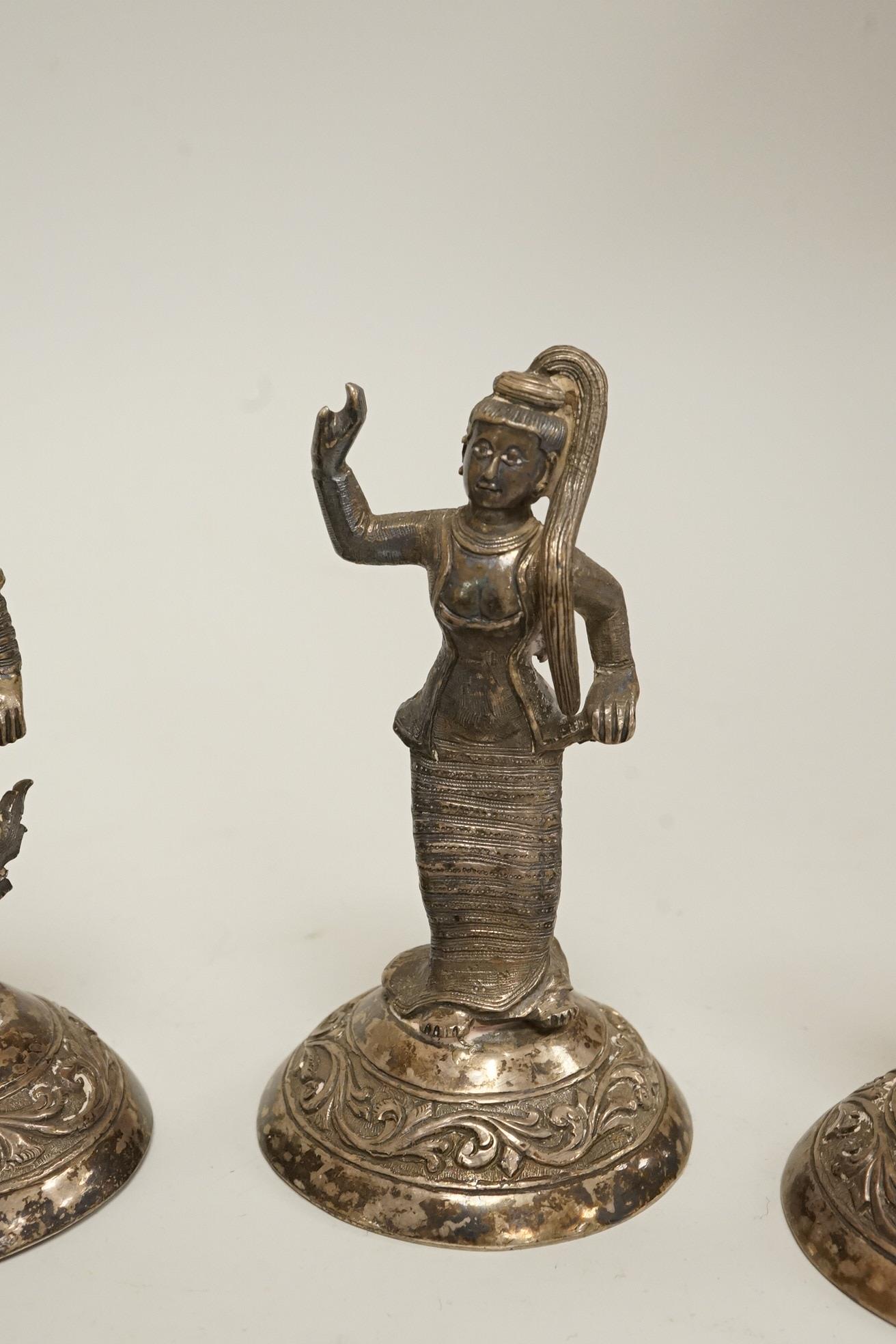 Four early 20th century Thai white metal figurines, 92mm et infra, 11.3oz.